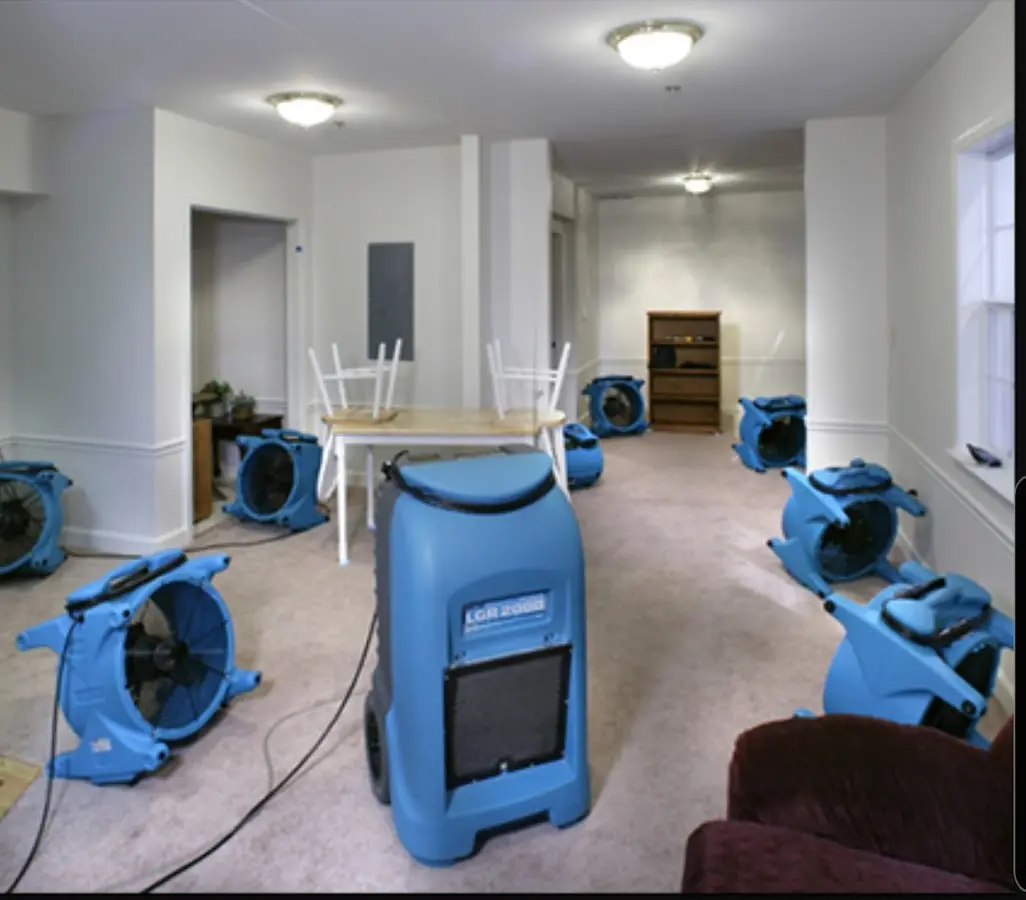 Air movers and dehumidifier setup for Water Extraction & Removal in Almena